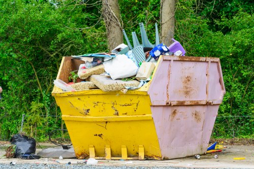 Front view of a skip on a residential street representing Putney Skip Hire services