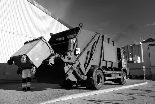 Company logo and safety banner for Putney Skip Hire